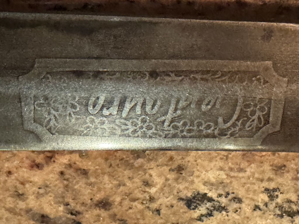 Centauro engraving on blade