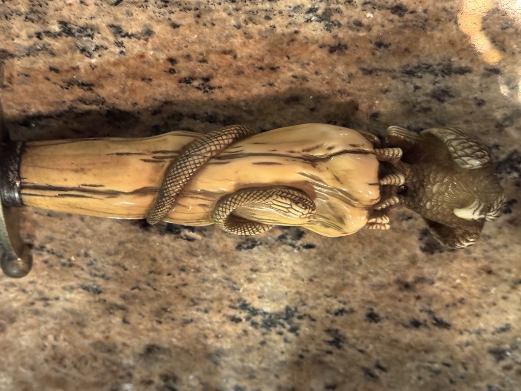 Carved ivory handle detail