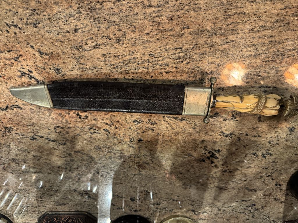 Knife sheathed